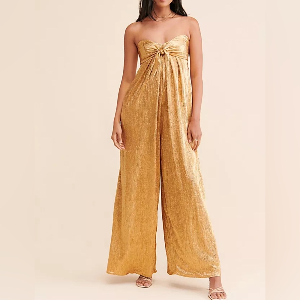 Free People Olivia Jumpsuit in gold size XS like new.